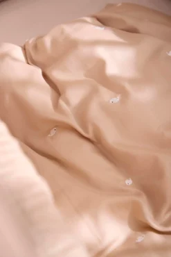 Junior sengetøj - Warm grey med broderet Christian hval