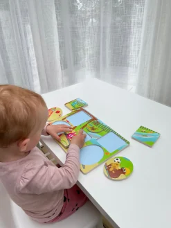 Puslespil i træ med legepladsmotiv